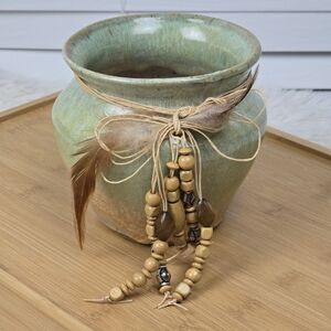 Signed Pottery Vase with Beads and Feathers